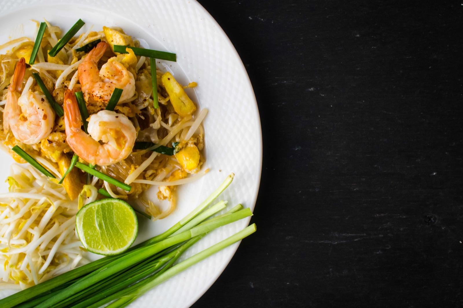 Shrimp Pad Thai with egg, bean sprouts, chives and lime