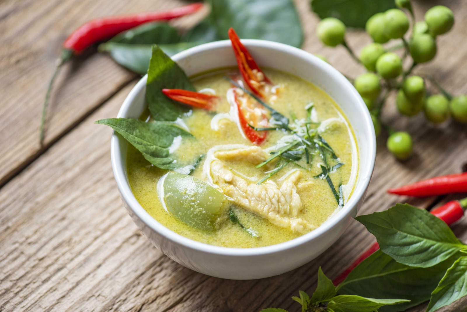 Thai green curry with chicken, eggplant, basil and red chilies