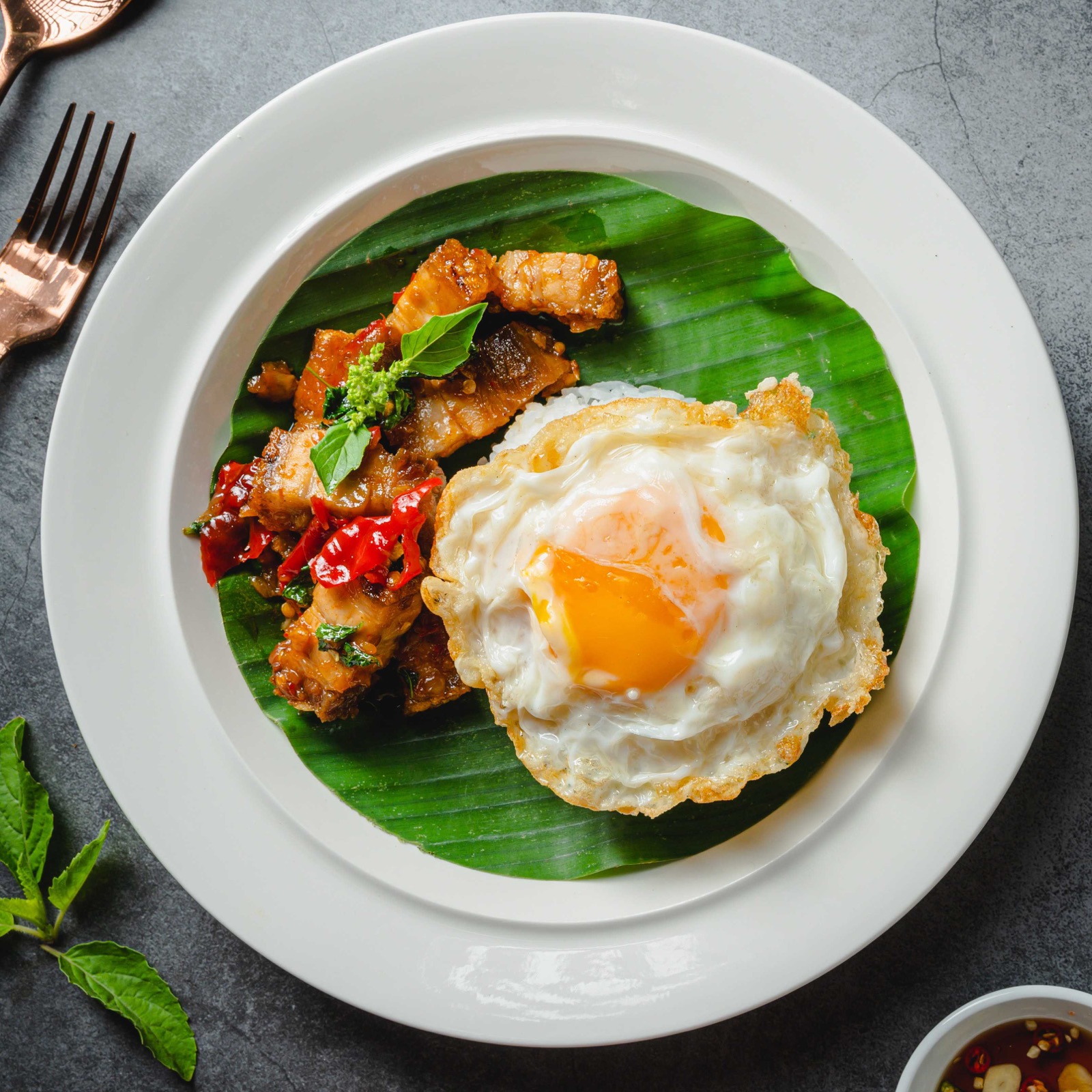 Thai basil pork with chilies, steamed rice and a fried egg